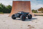 Arrma 1/5 Outcast 8S EXB 4X4 Roller Brushless Stunt Truck, Black (MEGATRONTOYS)